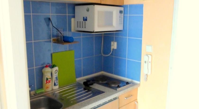 Luxury Family Hotel Royal Palace Прага Экстерьер фото A microwave oven in a kitchen