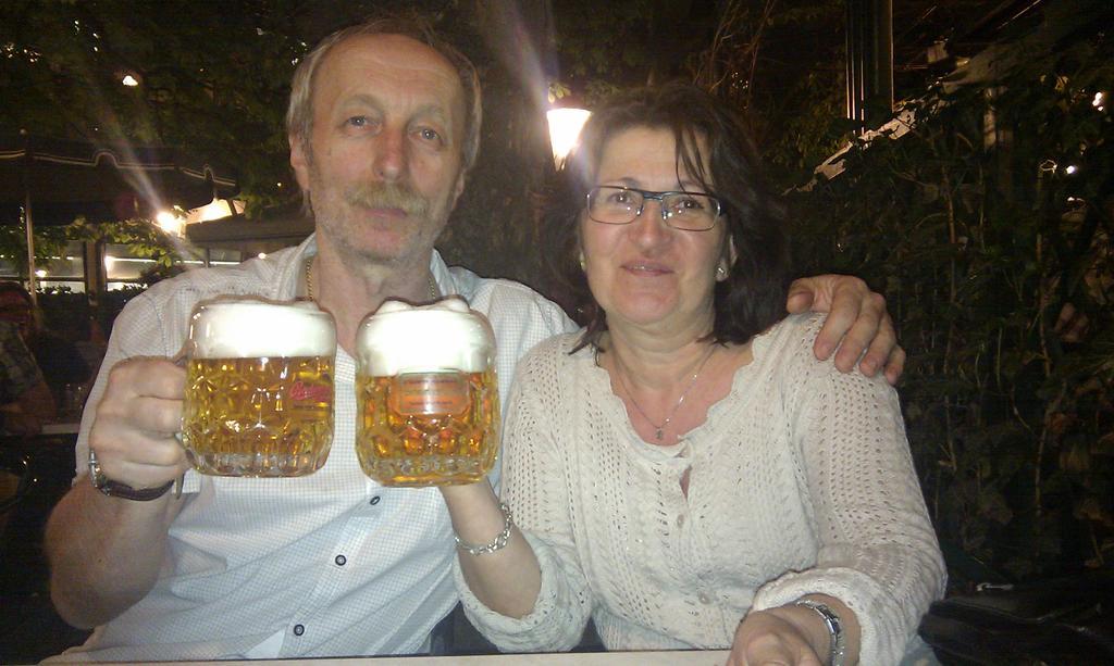 Luxury Family Hotel Royal Palace Прага Экстерьер фото A German couple drinking beer